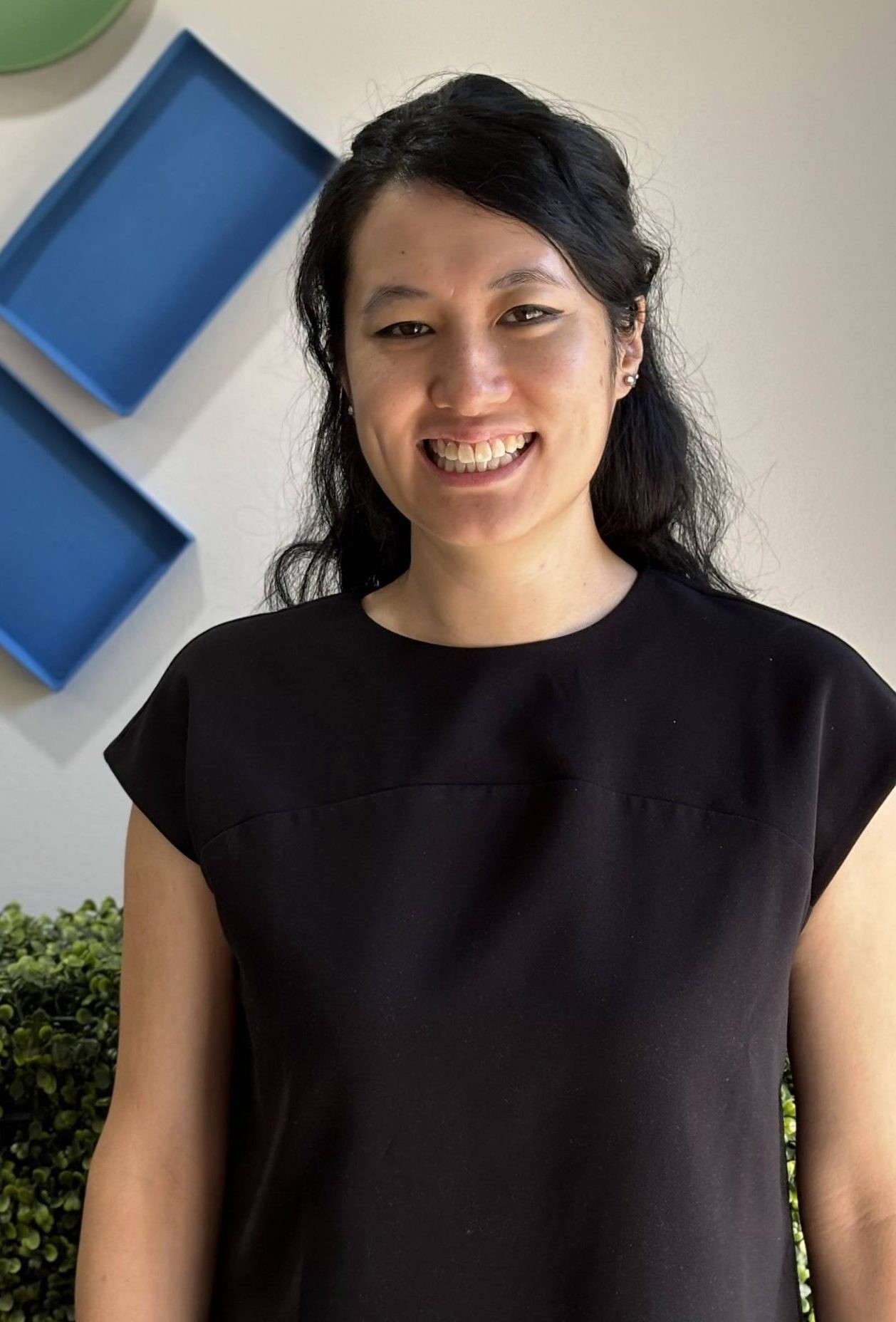 Kim, an AHPRA-registered osteopath at Infinity Health and Osteo
